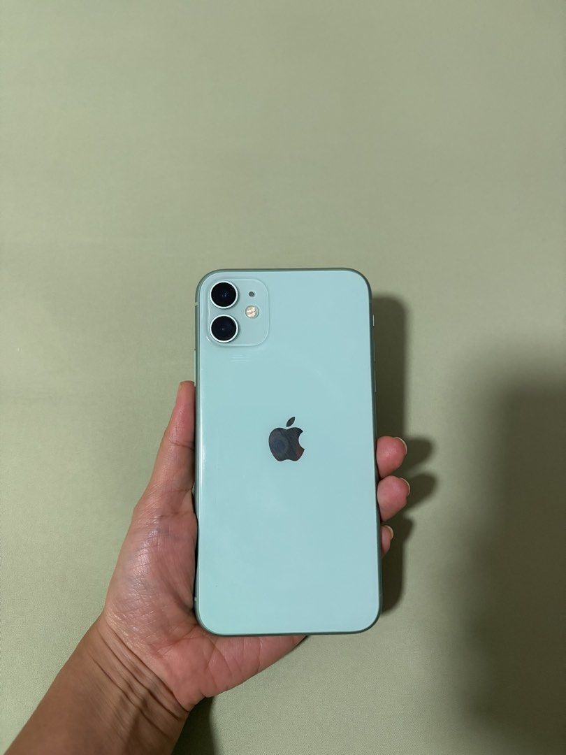 Iphone 11 (Category: iPhone 11 Series) located in Manila. Submitted by shellaoliv91280 (Listing ID 1467917228, Image 1). Description: Iphone 11 Green (mint/teal finish) No visible scratches Battery Percentage - 67% Memory - 64GB W/ case Loc - Quezon City Payment options: - Meet Up (QC, Ortigas, Manila) - Delivery (shouldered by customer; payment first).