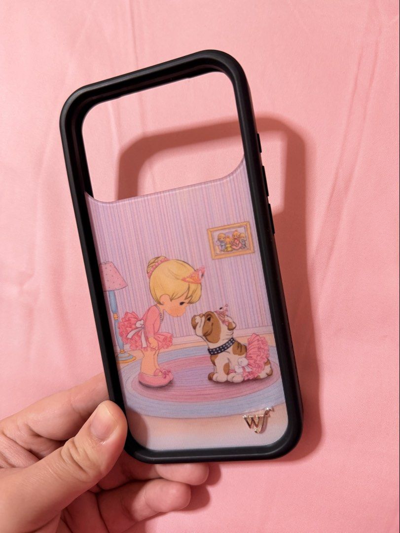 Iphone 17 Pro Wildflower Case Authentic - No Box (Category: Cases & Sleeves) located in Mandaluyong City. Submitted by nesscutie (Listing ID 1467996946, Image 1). Description: Selling my 17 Pro Wildflower Case (Precious Moments Ballerina Bulldog) Authentic - No Box -authentic (also bought from someone in Marketplace FB as Brandnew) -Like New! (No hairline or dents) - No box included because my toddler already turned all my WF Cases boxes into her