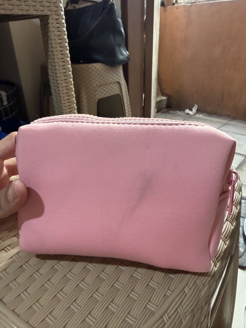Issy Tickled Pink Makeup Pouch (Category: Purses & Pouches) located in Paranaque City. Submitted by mryjwll (Listing ID 1468057372, Image 2). Description: - Brand: Issy - Color: Bright pastel pink - Closure: Smooth chunky zipper - Details: Front embossed logo lettering - Size: Compact and handy, fits easily inside a larger bag With stain that needs washing.
