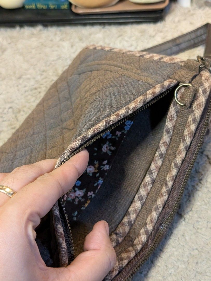 Japan Patchwork Handmadw Clutch Sling Bag (Category: Belt bags, Clutches and Pouches) located in San Pedro. Submitted by eurisilvers (Listing ID 1467973060, Image 3). Description: Has a lot of compartments, with card holders, can store cash and coins, a mini notebook, airpods etc. Convertible to sling bag aside from being a handbag or clutch. — shipping is via J&T Express — mop: gcash, maya, bank transfer — location: san pedro city, laguna.