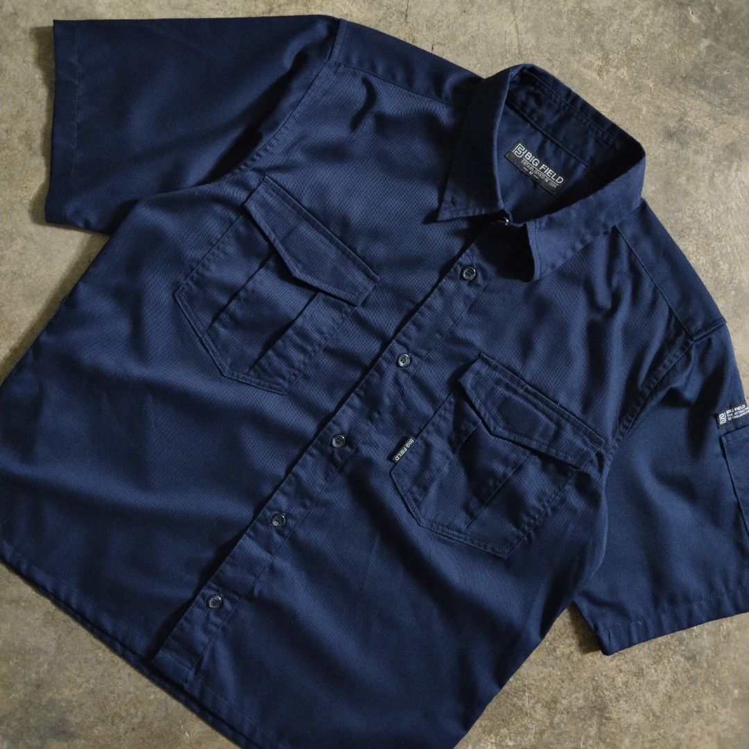 japanese workwear navy cropped polo (Category: Formal Shirts) located in Bulacan. Submitted by hustleoverluckphv2 (Listing ID 1468006124, Image 3). Description: japanese workwear navy cropped polo Medium on tag Measurements Width - 22" Length - 25" Claim - 499.