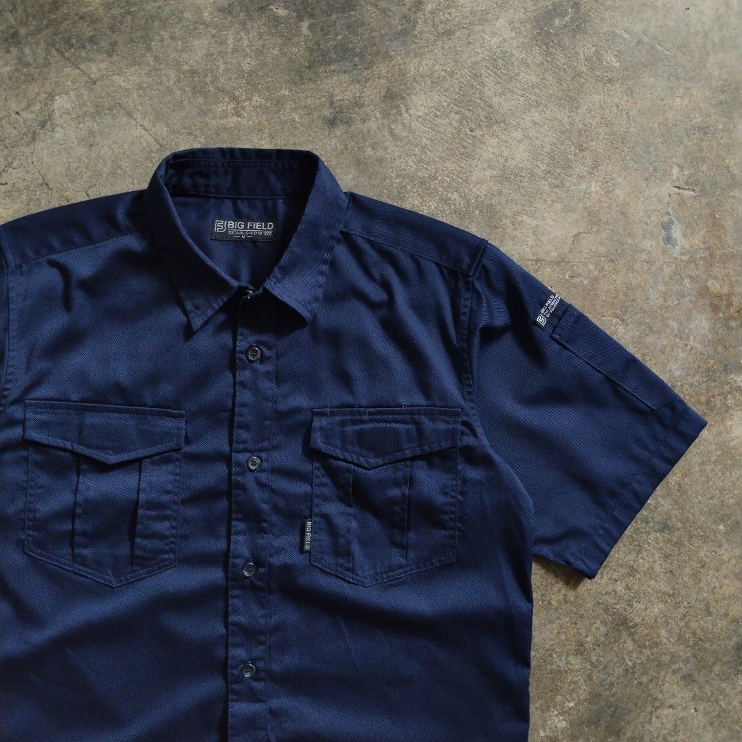 japanese workwear navy cropped polo (Category: Formal Shirts) located in Bulacan. Submitted by hustleoverluckphv2 (Listing ID 1468006124, Image 2). Description: japanese workwear navy cropped polo Medium on tag Measurements Width - 22" Length - 25" Claim - 499.
