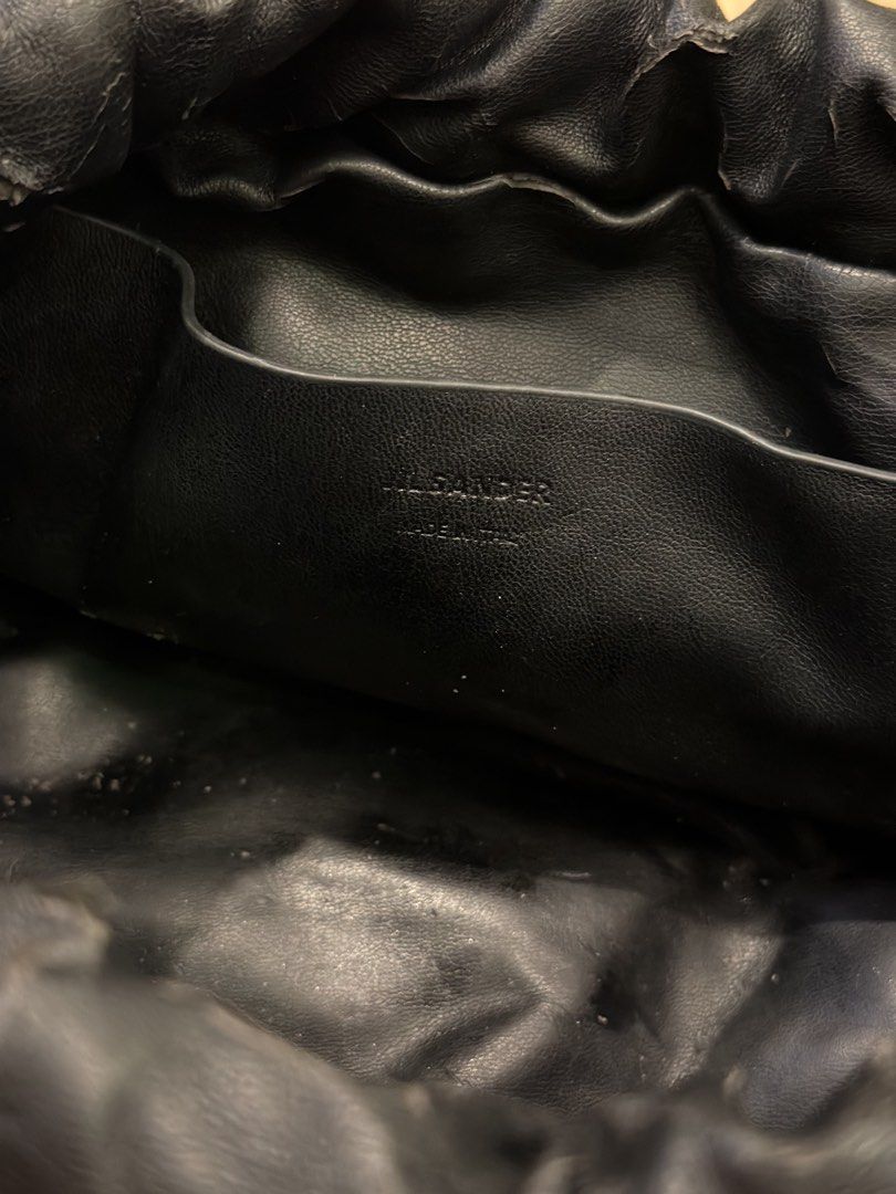 Jil Sander Canvas and Leather Drawstring Crossbody Bag (Category: Cross-body Bags) located in Manila. Submitted by _____car0usell (Listing ID 1467984455, Image 3). Description: Includes dust bag Notable flaking and peeling along the black leather drawstring collar.