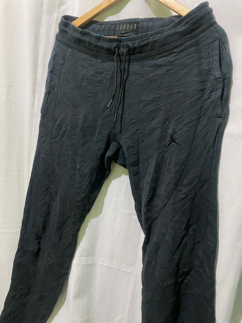 Jordan Black Joggers Sweatpants Size L (Category: Other Bottoms) located in Quezon City. Submitted by elihur.tuazon (Listing ID 1467841302, Image 3). Description: - Brand: Jordan - Color: Black - Size: Large - Material: Comfortable fleece - Fit: Standard fit for everyday wear - Waistband: Elastic with adjustable drawstrings - Details: Small embroidered Jumpman logo on the left leg - Cuffs: Ribbed at the ankles - Condition: Great for gym sessions 