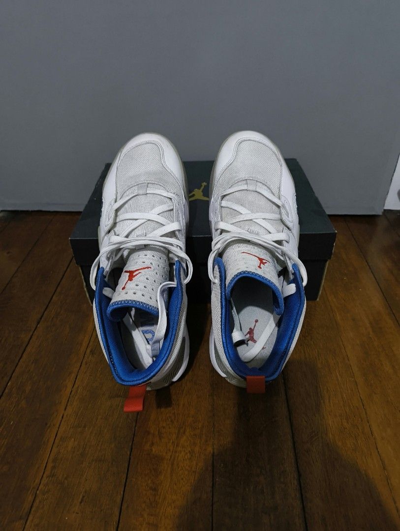 Jordan Basketball Shoes (Category: Sneakers) located in Pasig City. Submitted by cxdwr_ (Listing ID 1467955809, Image 3). Description: - Model: Jordan - Colorway: White mesh and leather upper with striking blue and red details - Condition: Clean laces and insoles, minor scuff mark near the front toe box on one shoe - Packaging: Original box included - Slightly negotiable .