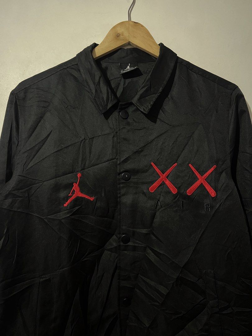 JORDAN X KAWS COACH JACKET (Category: Coats, Jackets and Outerwear) located in Manila. Submitted by dailystrategythrift (Listing ID 1467841450, Image 3). Description: JORDAN X KAWS COACH JACKET (HQR) SIZE MEDIUM ON TAG WIDTH - 21 LENGTH - 27 EXCELLENT ASNEW CONDITION💯❤️.
