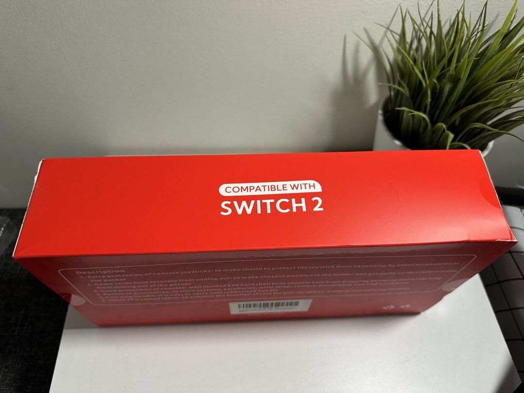 JOYLINK Travel Case Compatible with Nintendo Switch 2 OLED Switch (Category: Cases & Covers) located in Cabanatuan. Submitted by s.kit.27 (Listing ID 1468017529, Image 3). Description: - Compatible with Nintendo Switch 2 and Switch OLED models - Tough molded hard shell exterior safeguards against drops and bumps - Secure interior card slots prevent game cards from sliding - Built-in mesh pocket for joycons, earphones, and cables - Durable, waterp