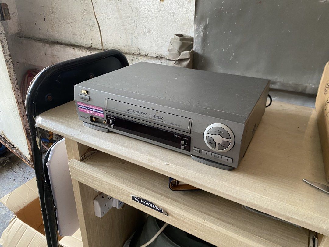 JVC HR-J471MS Multi System DA 4 Head VCR (Category: Blu-Ray & Media Players) located in Imus. Submitted by nhelsg2 (Listing ID 1467886292, Image 3). Description: Defective(For parts only) - Model: JVC HR-J471MS Multi-System VCR - Heads: DA 4-head system for clear playback - Power: Auto-voltage 90-260V (AC 110V-240V cord included), works globally without issues - Ports: Standard rear AV and antenna ports - Design: Classic grey chassis with user-fr