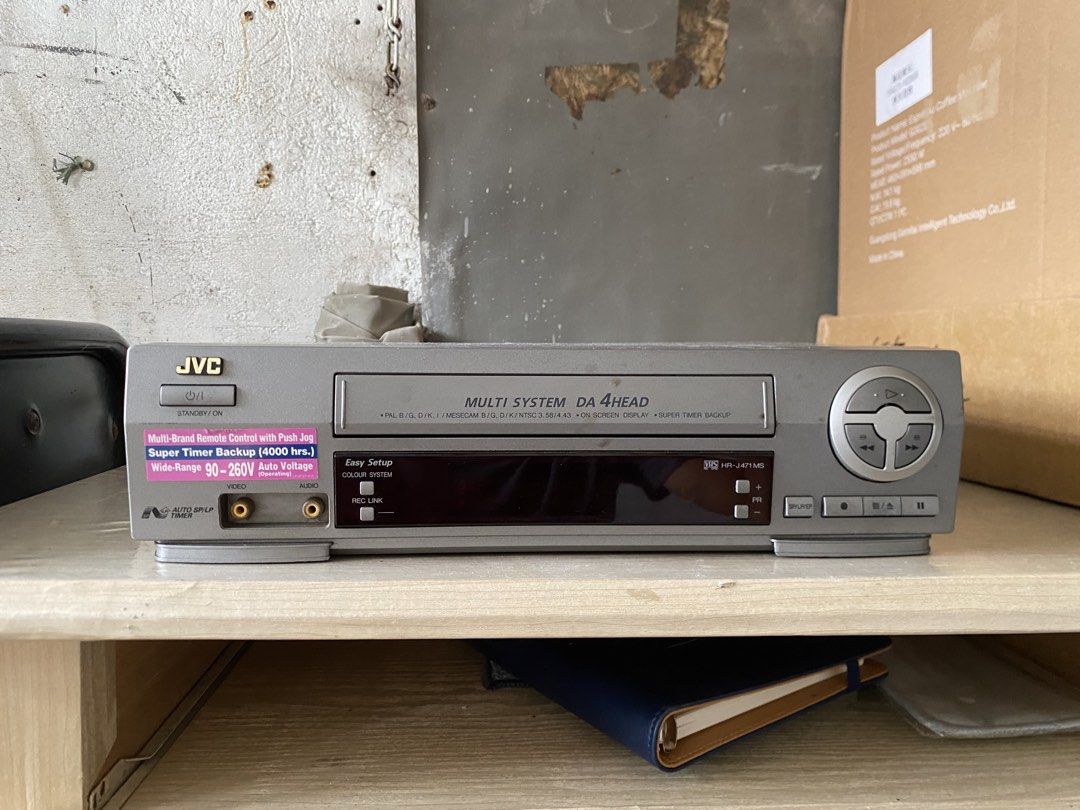 JVC HR-J471MS Multi System DA 4 Head VCR (Category: Blu-Ray & Media Players) located in Imus. Submitted by nhelsg2 (Listing ID 1467886292, Image 1). Description: Defective(For parts only) - Model: JVC HR-J471MS Multi-System VCR - Heads: DA 4-head system for clear playback - Power: Auto-voltage 90-260V (AC 110V-240V cord included), works globally without issues - Ports: Standard rear AV and antenna ports - Design: Classic grey chassis with user-fr