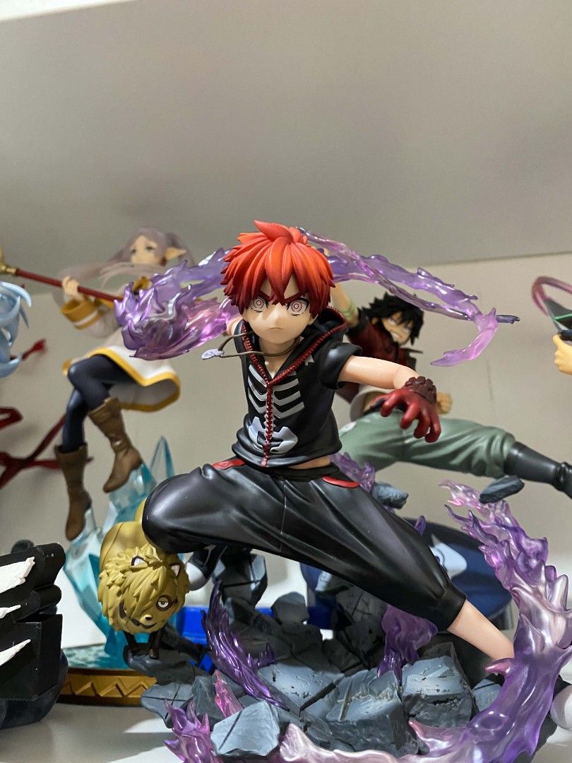 Kabane Medicos 1/8 Scale Loose (Category: Figurines & Statues) located in Cavite. Submitted by isiahnova (Listing ID 1467937099, Image 1). Description: - Character: Kem Ji Hao figure with detailed sculpt and great paint work - Design: Dynamic pose on a rocky base featuring striking red hair, a skeleton zip-up hoodie, and dark pants - Special Details: Eye-catching purple translucent swirling effect parts and a small creature/dog head sculpted unde