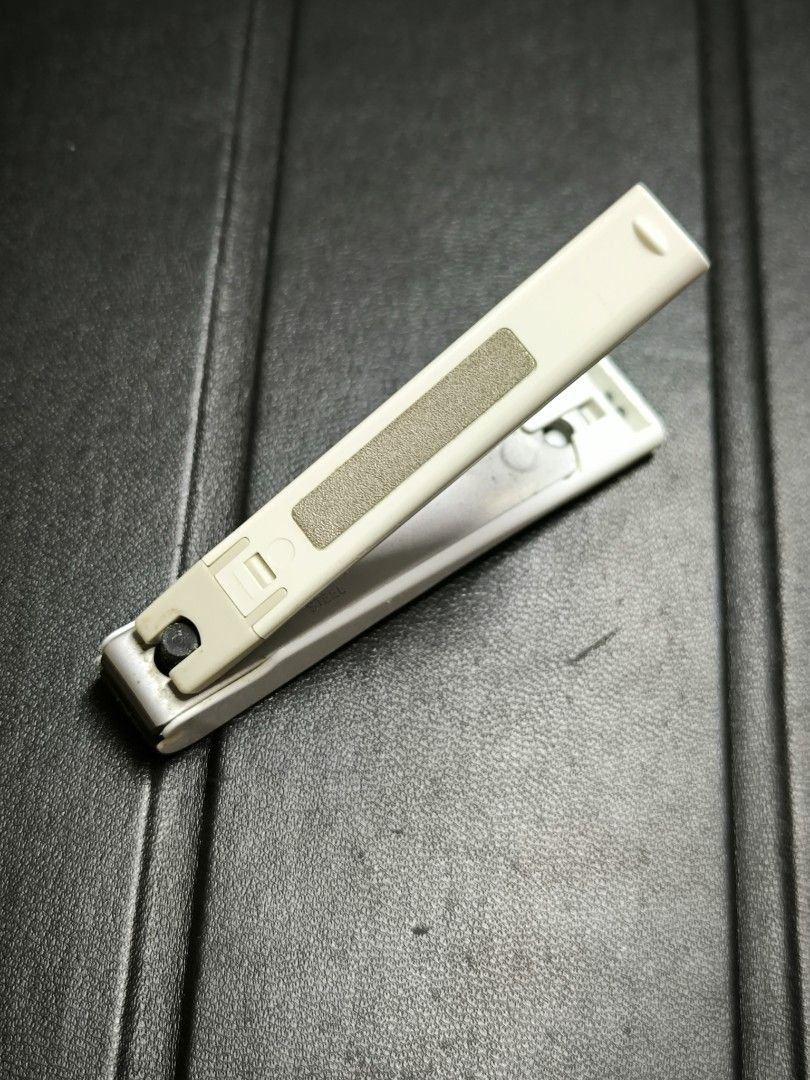 KAI Stainless Steel Nail Clipper (Category: Hands & Nails) located in Angeles City. Submitted by yellowbrickstore (Listing ID 1467910821, Image 1). Description: - Authentic KAI stainless steel nail clipper - Built-in handle shell keeps nail clippings neatly contained - Compact folding design with an integrated nail file on the lever - Perfect, practical tool for everyday grooming - Shows minor signs of previous use but fully functional.