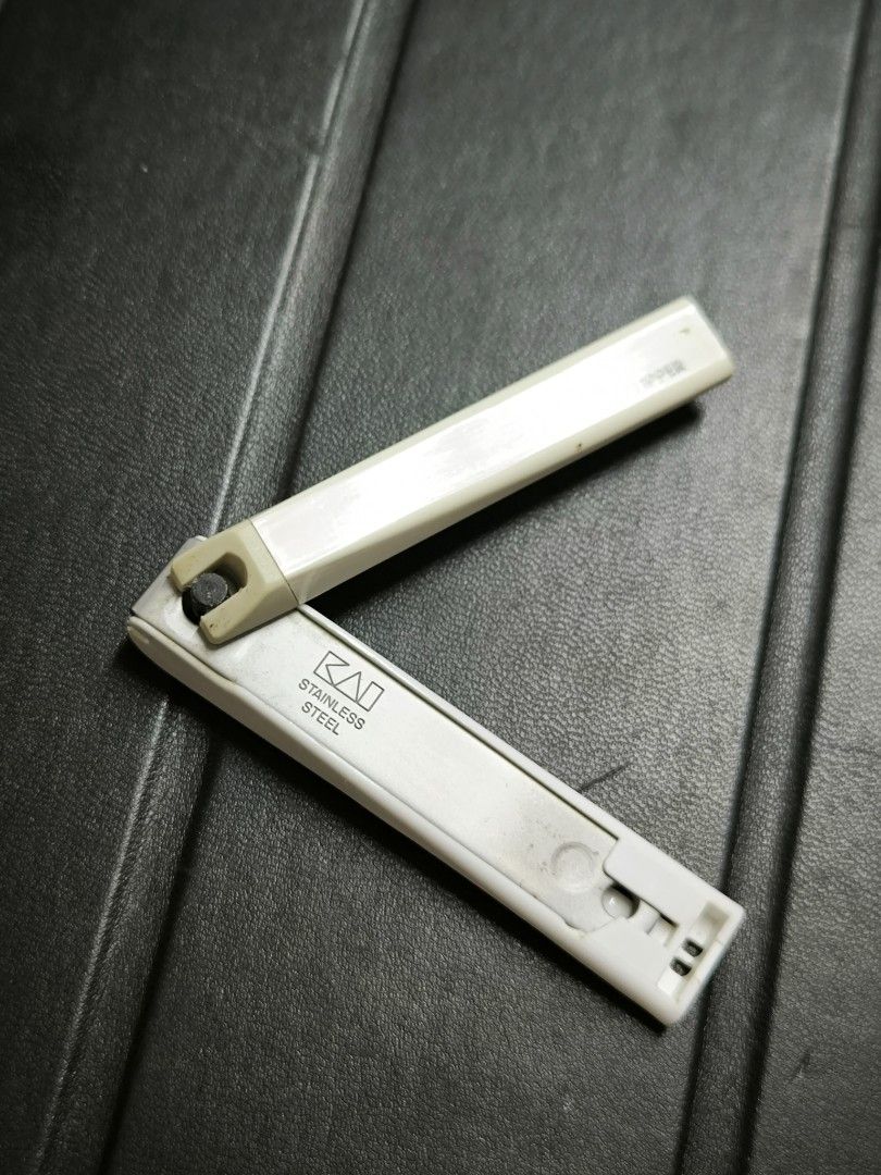 KAI Stainless Steel Nail Clipper (Category: Hands & Nails) located in Angeles City. Submitted by yellowbrickstore (Listing ID 1467910821, Image 2). Description: - Authentic KAI stainless steel nail clipper - Built-in handle shell keeps nail clippings neatly contained - Compact folding design with an integrated nail file on the lever - Perfect, practical tool for everyday grooming - Shows minor signs of previous use but fully functional.