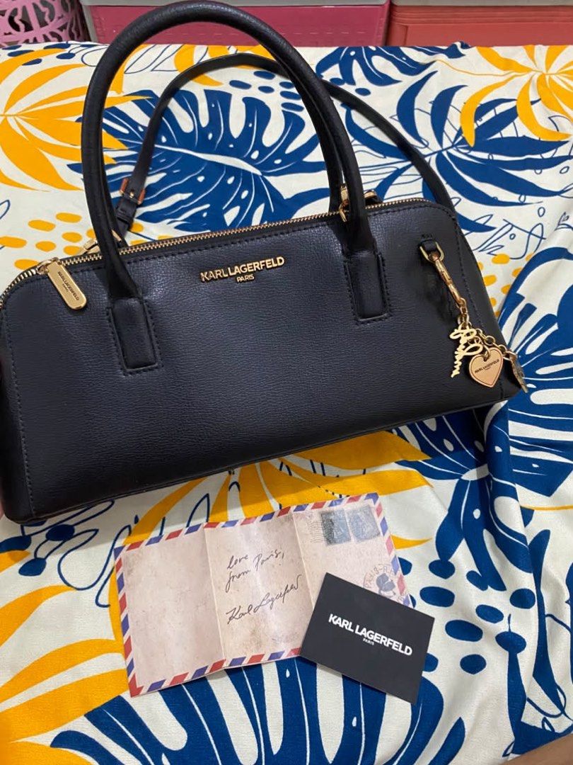 Karl Lagerfeld Paris Black Leather (Category: Luxury Bags & Wallets) located in Luna. Submitted by wescart (Listing ID 1467890351, Image 1). Description: Used Once Like Brandnew.