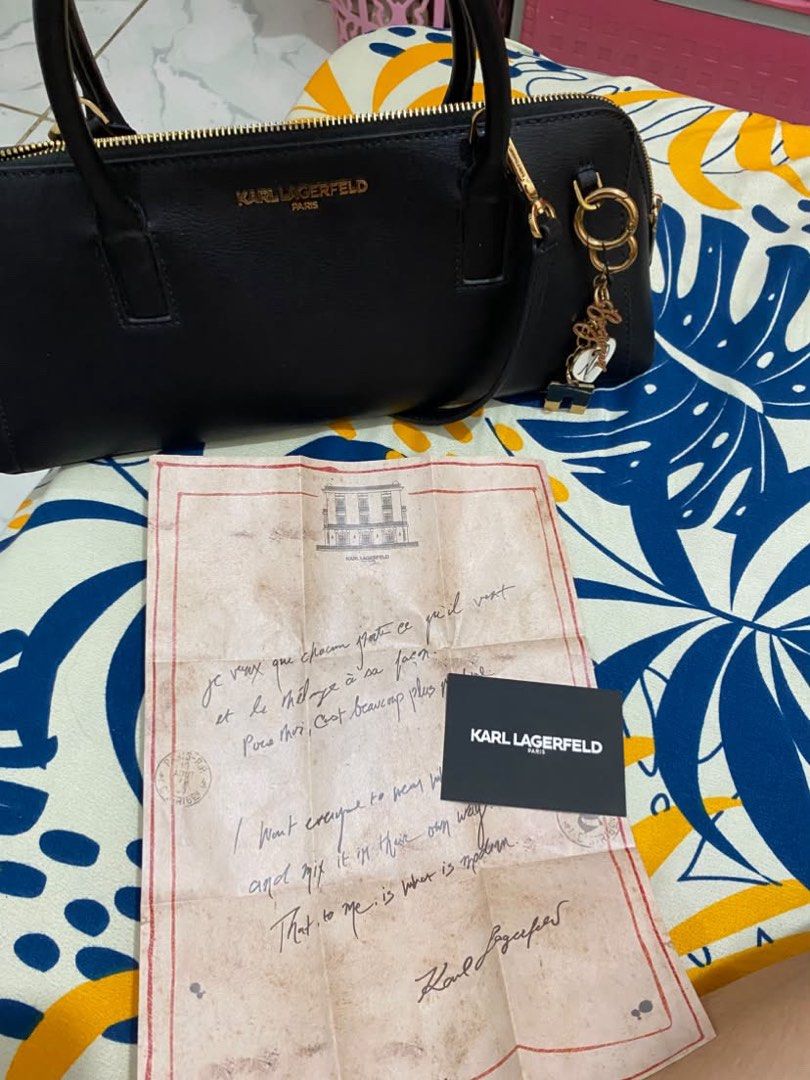 Karl Lagerfeld Paris Black Leather (Category: Luxury Bags & Wallets) located in Luna. Submitted by wescart (Listing ID 1467890351, Image 3). Description: Used Once Like Brandnew.