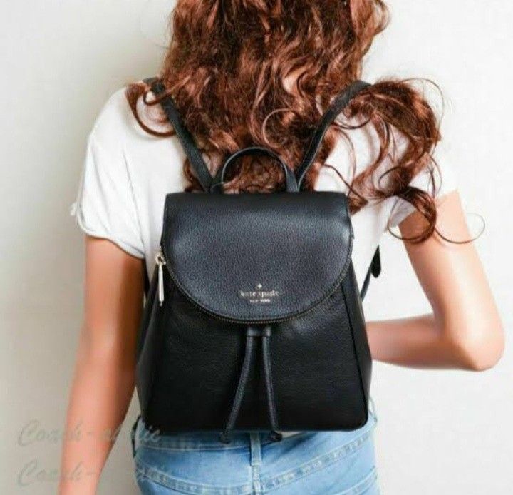 Kate Spade Black Pebbled Leather Medium Backpack (Category: Backpacks) located in Navotas City. Submitted by riyuwi (Listing ID 1467880010, Image 2). Description: PreOwned Lightly Used Authentic Kate Spade New York Pebbled leather Medium Backpack - Material: Premium black pebbled leather - Closure: Flap top with magnetic snap and drawstring cinched main compartment - Interior: Signature spade print lining - Straps: Adjustable shoulder straps with