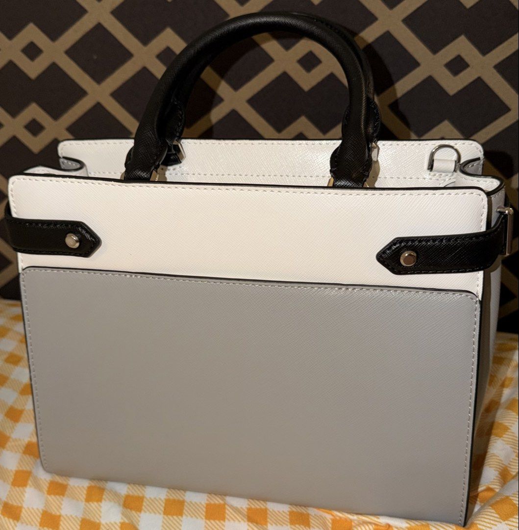 Kate Spade Staci Medium Satchel Nimbus Grey (Category: Tote Bags) located in Manila. Submitted by nayeoniescart (Listing ID 1468030164, Image 2). Description: BRAND NEW: Kate Spade Staci Medium Satchel - Colorway: Nimbus Grey, White, and Black Colorblock - Material: Premium Saffiano Leather - Hardware: Gold-tone with logo lettering - Condition: Brand new with original tags attached (Model WKRU6952) - Features: Dual top handles, structured silhoue