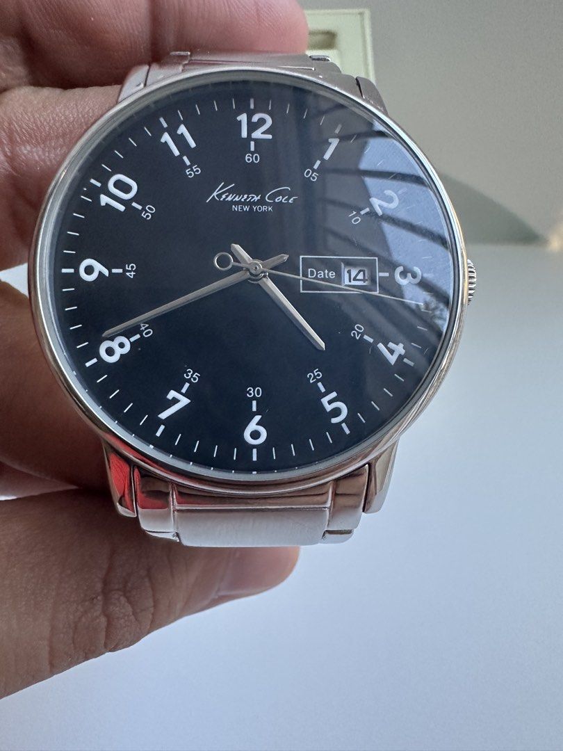 Kenneth Cole KC3869 (Category: Men's Watches) located in Manila. Submitted by daddy_athritis (Listing ID 1467928489, Image 3). Description: Model: KC3869 Kenneth Cole New York Color: Black Dial Stainless Steel Watch Silver-Tone hands. Silver bracelet. Condition: 1 visible scratch near the face and minor scratches in the bracelet Case Size: 42 mm diameter Water Resistance: Safe for accidental splashes,rain drops, or brief contact while washing you