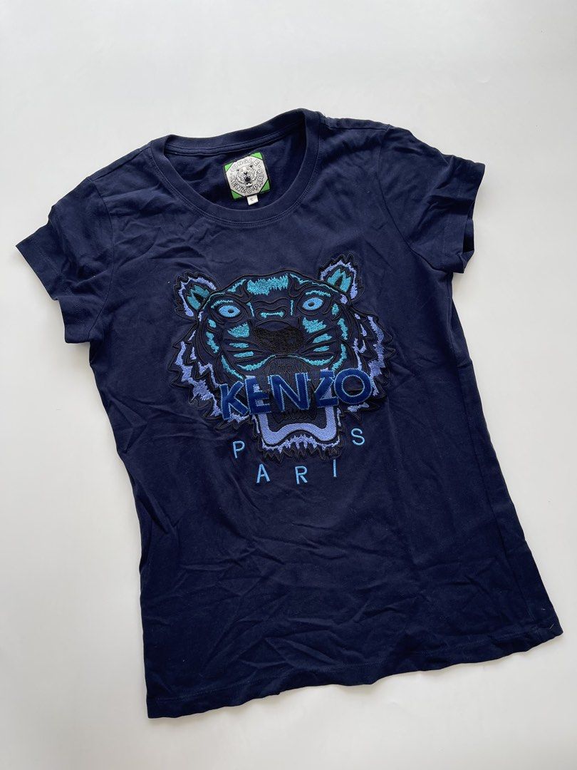 Kenzo Embroidered Navyblue Tshirt (Category: Shirts) located in Bacolod City. Submitted by euniceclothing_coph (Listing ID 1467857446, Image 1). Description: Like new Embroidered Logo 100% cotton fabric.