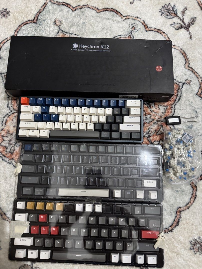 Keychron K12 Wireless Mechanical Keyboard (Category: Computer Keyboard) located in Manila. Submitted by crledwrd (Listing ID 1467901542, Image 2). Description: - Model: Keychron K12 Wireless Mechanical Keyboard (Compact Layout) - Condition: Fully functional, well-maintained, and ready for use - Switches: Hot-swappable board currently installed with AKKO Lavander switch and Gateron Brown - Inclusions: Original box and keycap puller tool - Extras: 