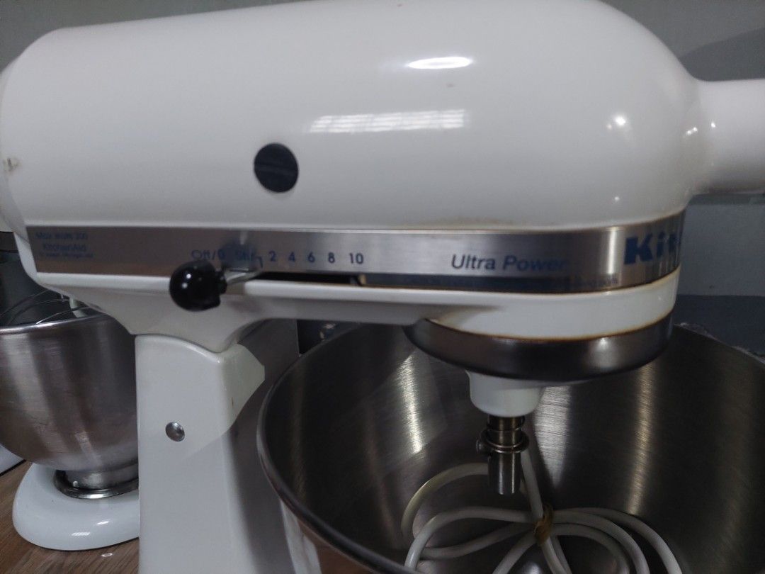 KitchenAid Ultra Power Stand Mixer White (Category: Hand & Stand Mixers) located in Pasig City. Submitted by brightocean_bb44a1 (Listing ID 1467976952, Image 1). Description: - Color: Classic White - Power: 300 watts, standard plug - Speeds: 10 versatile settings from stir to whip - Inclusions: Stainless steel bowl, flat beater, wire whip, and dough hook - Condition: Fully functional with minor cosmetic wear around the speed control lever and tri