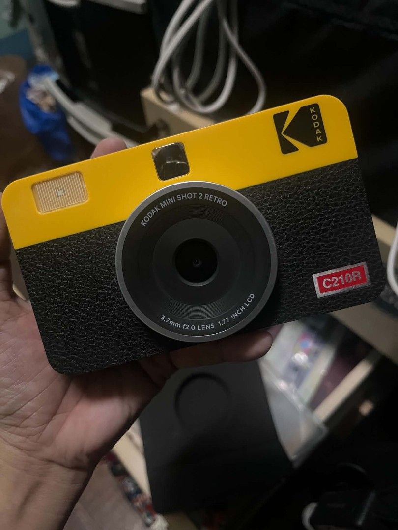 Kodak Mini Shot 2 Retro C210R Instant Camera (Category: Cameras) located in Pasig City. Submitted by gentlefox_45b9fc (Listing ID 1468054857, Image 1). Description: - Kodak Mini Shot 2 Retro Camera (Model: C210R) - Color: Yellow and Black - Lens: 3.7mm f2.0 - LCD Screen: 1.77 inch - Feature: Instant photo capture - Ideal for: Capturing memories on the go.