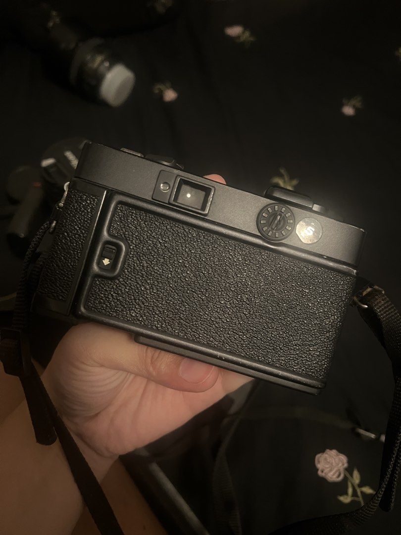 Konica C35 EF 35mm Film Camera with Strap (Category: Cameras) located in Marikina City. Submitted by yelsellsthings (Listing ID 1468052438, Image 2). Description: - Model: Konica C35 EF 35mm compact film camera - Color: Classic black body with textured grip - Features: Built-in electronic flash, clear viewfinder, and smooth film advance dial Condition: Not actually sure if flash is still working but may sound na nagchcharge like how it was so idk