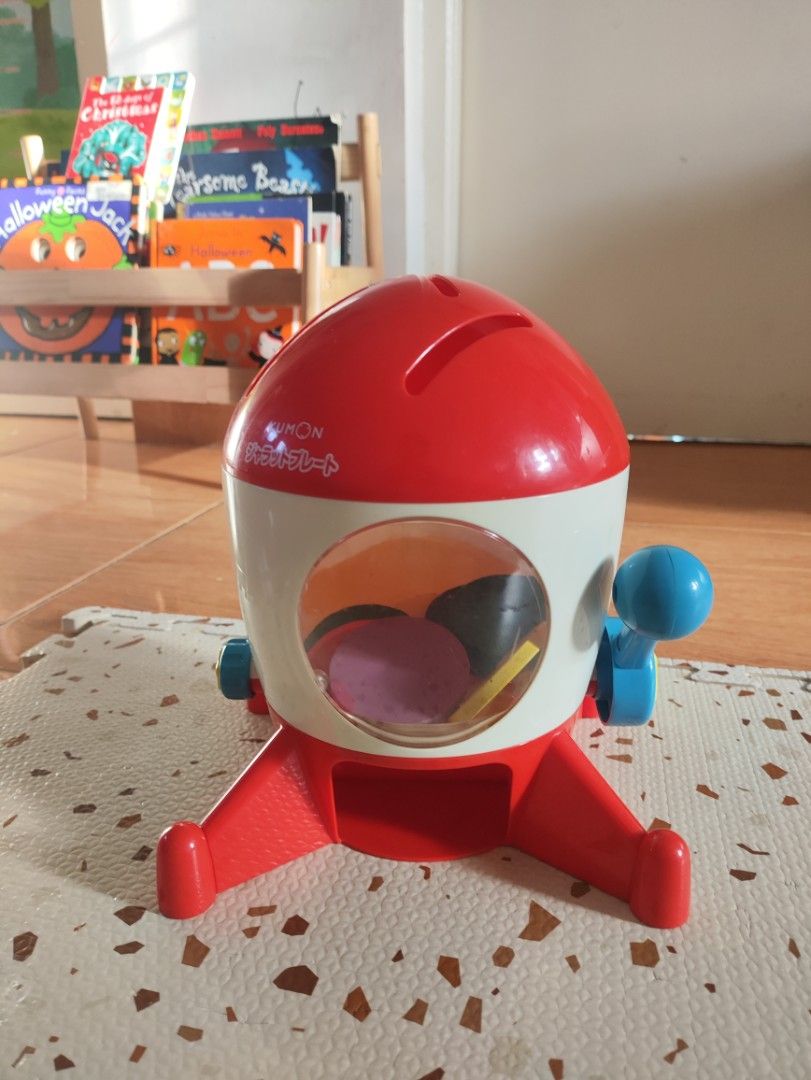 Kumon Counting Toy (Category: Infant Playtime) located in Taguig. Submitted by cleanupmomma (Listing ID 1467917861, Image 1). Description: Please take time to read ❤️ EUC with a big wooden rainbow coin 🌈 10pcs wooden coins complete wyiwyg.