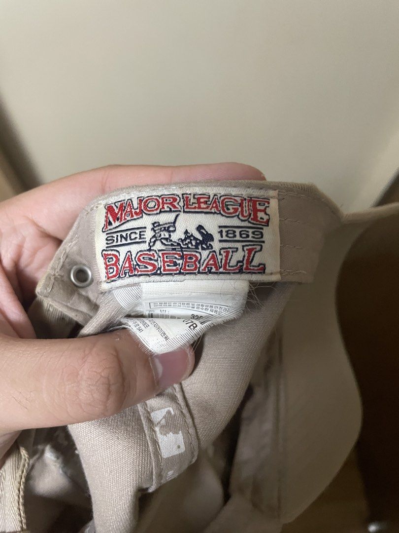 LA Dodgers Cap (Category: Caps & Hats) located in Pasig City. Submitted by randomclothes_ (Listing ID 1467949437, Image 3). Description: - Authentic MLB LA Dodgers baseball cap - Color: Beige with white embroidered LA logo - Classic curved brim and adjustable strap for a custom fit - Official Major League Baseball tag included - Clean fabric, 100% stain-free and undamaged.