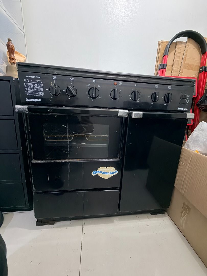 La Germania Gas Range with Hood (Category: Cookers) located in Quezon City. Submitted by 30somethingtreasures (Listing ID 1468003671, Image 2). Description: - Type: La Germania Gas Range - Cooktop: 4 gas burners and 1 center electric hotplate and range hood - Oven: Built-in oven underneath with front control knobs - Condition: Used, good working condition - Dimensions: Gas Range - 33.5" x 36" x 19.5", Range Hood - 35" x 20" x 6" - Delivery: Picku