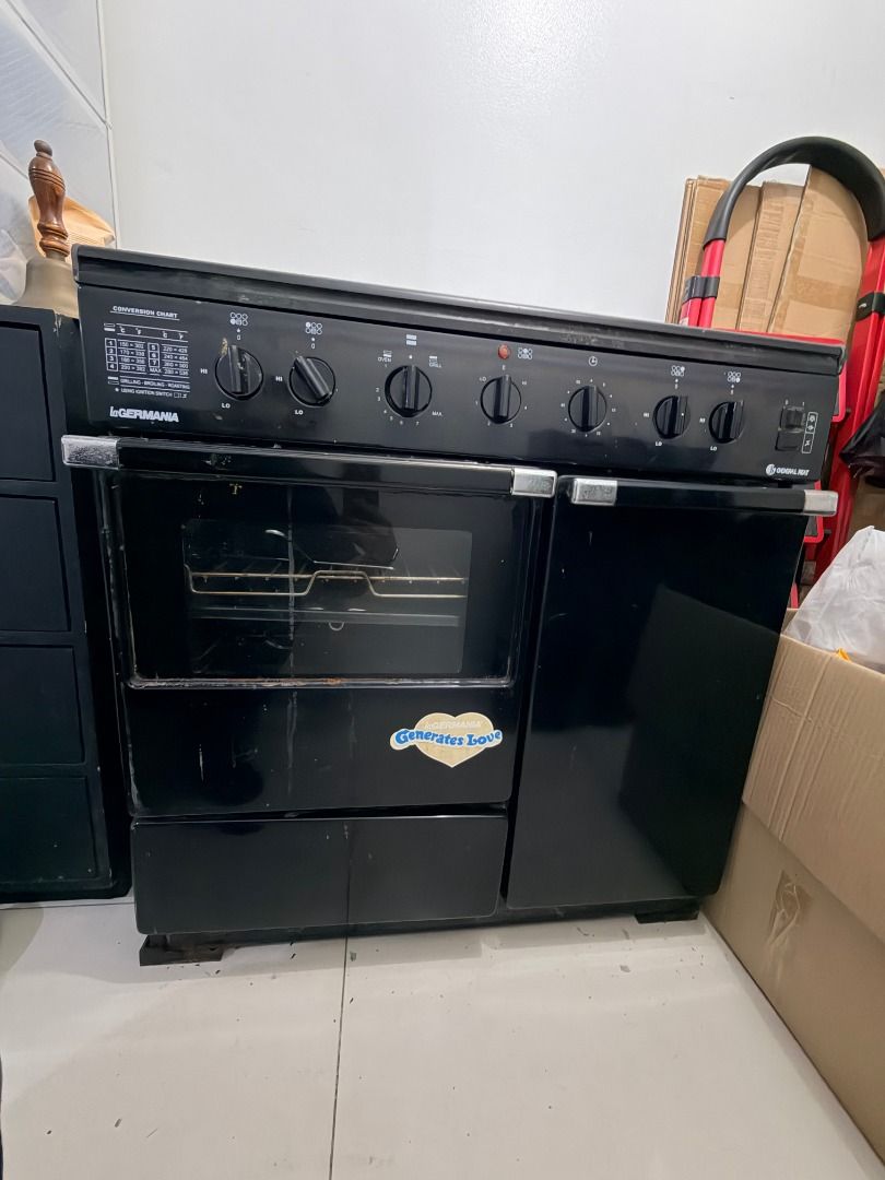 La Germania Gas Range with Hood (Category: Cookers) located in Quezon City. Submitted by 30somethingtreasures (Listing ID 1468003671, Image 1). Description: - Type: La Germania Gas Range - Cooktop: 4 gas burners and 1 center electric hotplate and range hood - Oven: Built-in oven underneath with front control knobs - Condition: Used, good working condition - Dimensions: Gas Range - 33.5" x 36" x 19.5", Range Hood - 35" x 20" x 6" - Delivery: Picku