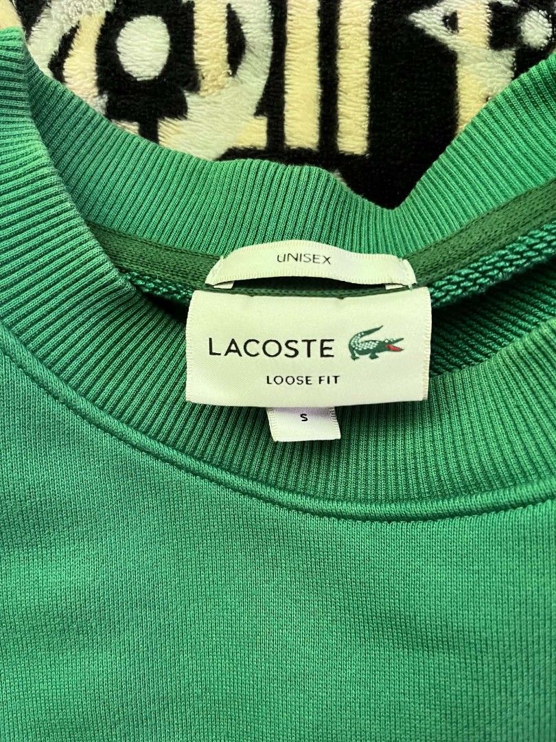 Lacoste Fleece Sweatshirt (Category: Luxury Apparel) located in Marikina City. Submitted by doobiethrift (Listing ID 1467918585, Image 3). Description: Size Small 22 W 26 L No issue / flaws.