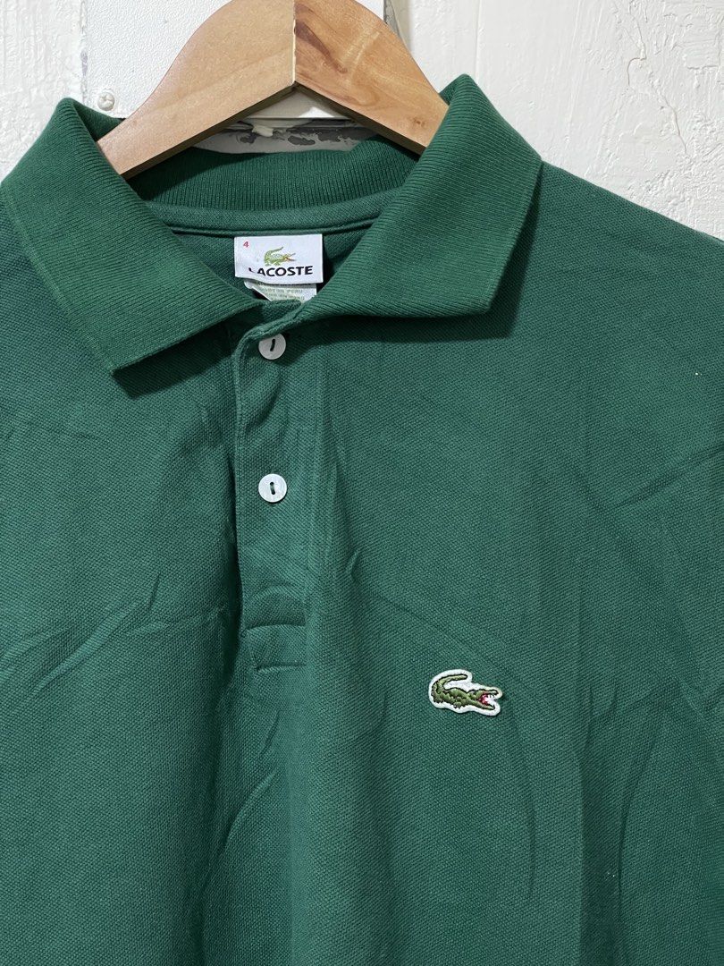 Lacoste green polo shirt size 4 (Category: Luxury Apparel) located in Marikina City. Submitted by joshuaades21107 (Listing ID 1467982713, Image 2). Description: Lacoste green polo shirt Size 4 on tag 20 width 27 length Excellent condition, very clean collar no fold line .