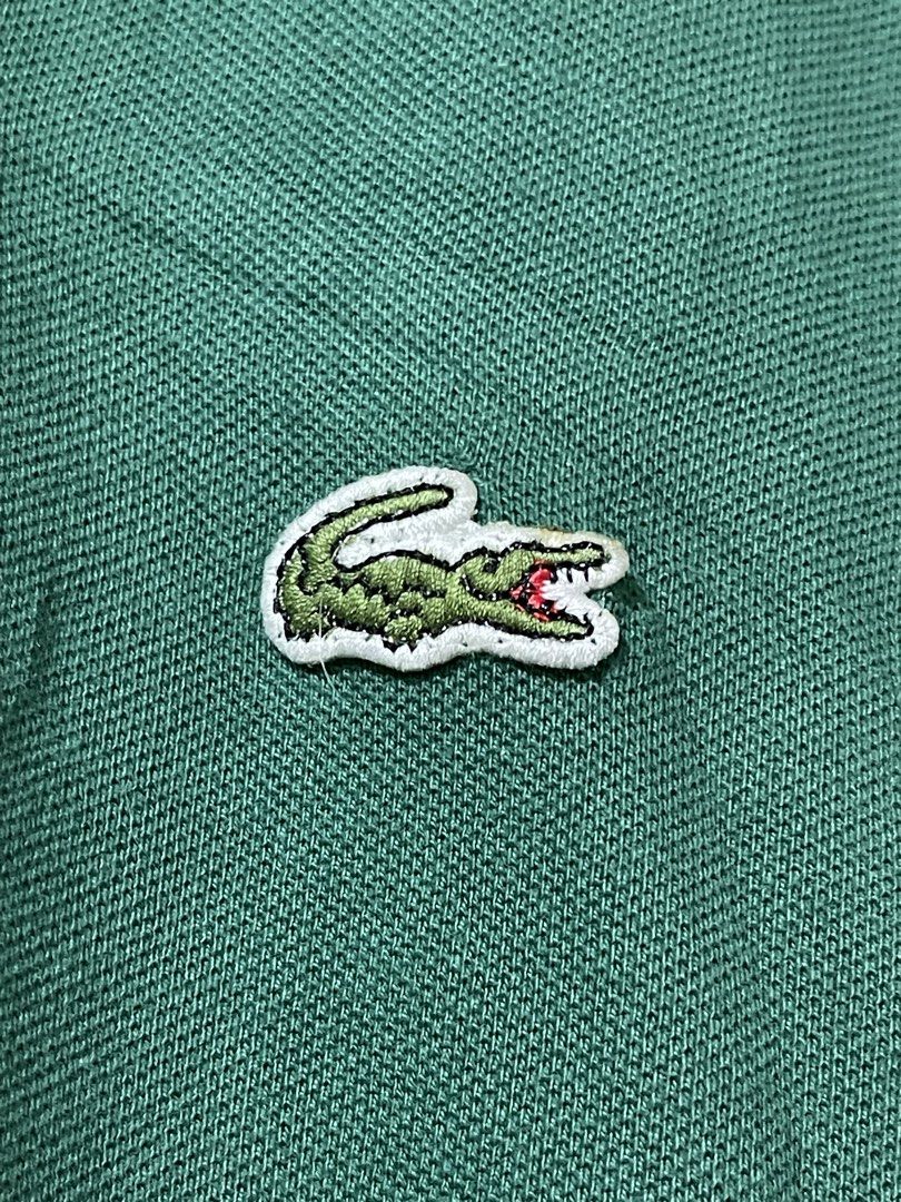 Lacoste green polo shirt size 4 (Category: Luxury Apparel) located in Marikina City. Submitted by joshuaades21107 (Listing ID 1467982713, Image 3). Description: Lacoste green polo shirt Size 4 on tag 20 width 27 length Excellent condition, very clean collar no fold line .