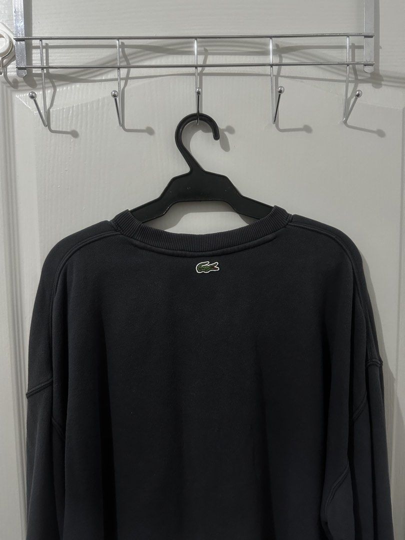Lacoste Live Crest Logo Dark Grey Sweatshirt Size M (Category: Coats, Jackets and Outerwear) located in Manila. Submitted by driftthrift (Listing ID 1467894392, Image 2). Description: - Brand: Lacoste Live - Style: Crewneck sweatshirt - Color: Dark grey - Size: M (fit large to xl) - Material: 100% cotton - Design: Large green and purple chest graphic with stripes, iconic embroidered crocodile logo on the back collar - Details: Ribbed cuffs, hem, 