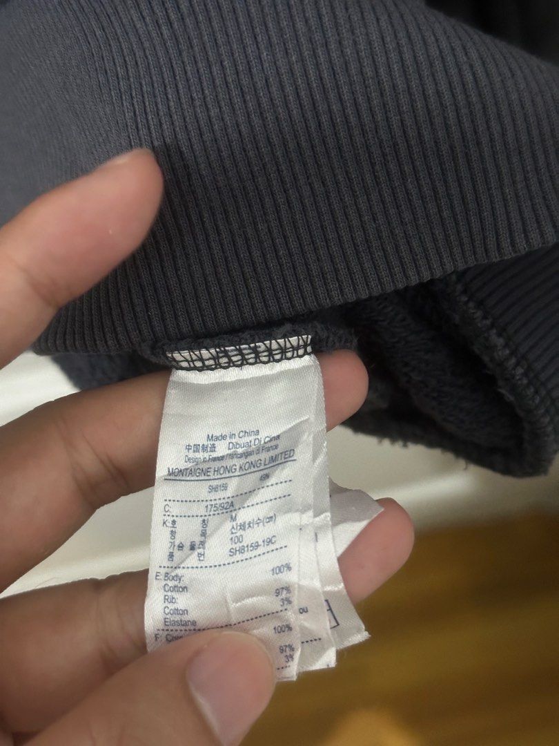 Lacoste Live Crest Logo Dark Grey Sweatshirt Size M (Category: Coats, Jackets and Outerwear) located in Manila. Submitted by driftthrift (Listing ID 1467894392, Image 3). Description: - Brand: Lacoste Live - Style: Crewneck sweatshirt - Color: Dark grey - Size: M (fit large to xl) - Material: 100% cotton - Design: Large green and purple chest graphic with stripes, iconic embroidered crocodile logo on the back collar - Details: Ribbed cuffs, hem, 