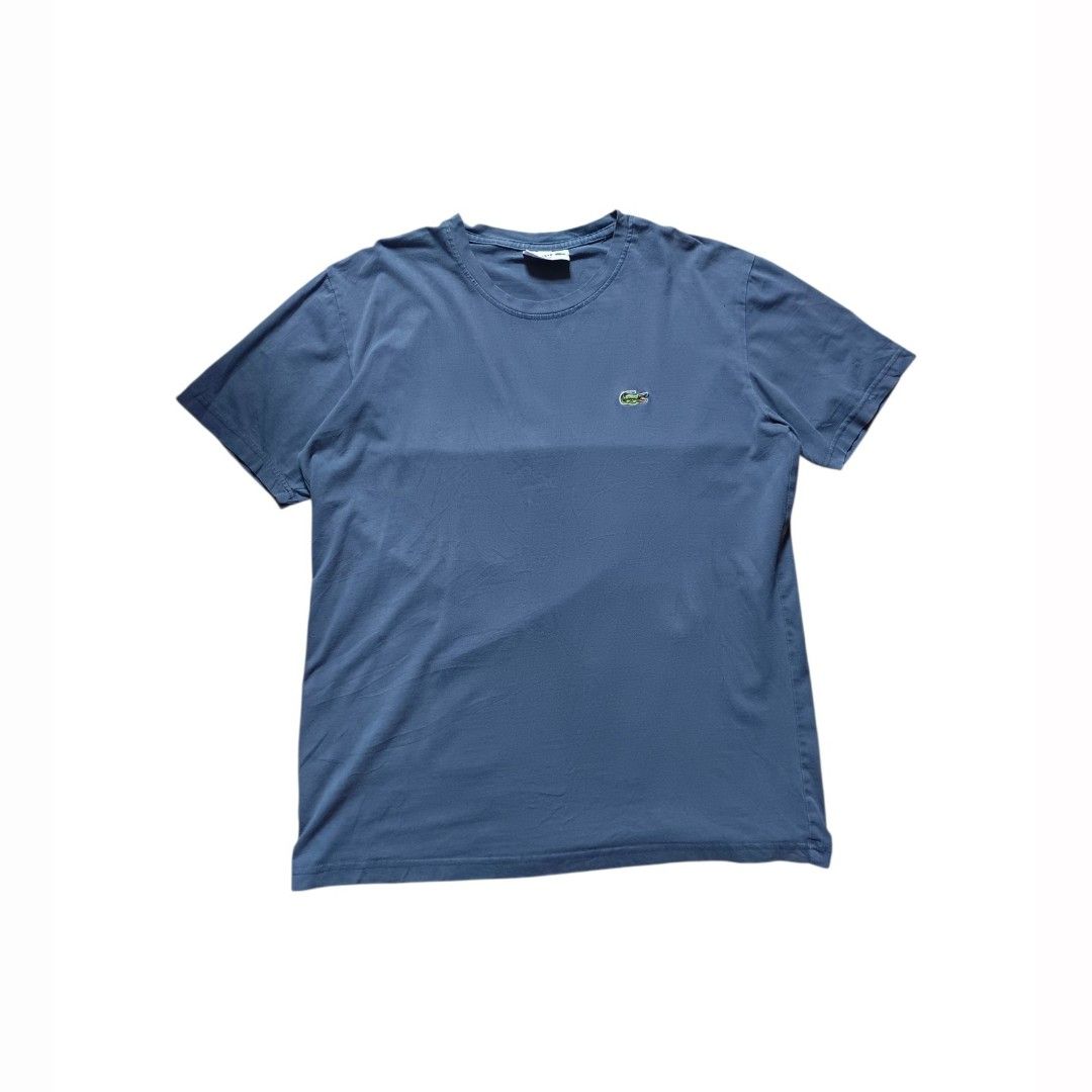 Lacoste navy blue shirt (Category: Formal Shirts) located in Davao. Submitted by jeff_thrifts (Listing ID 1467850158, Image 1). Description: good condition see last photo for the issue no pinholes dm if interested.