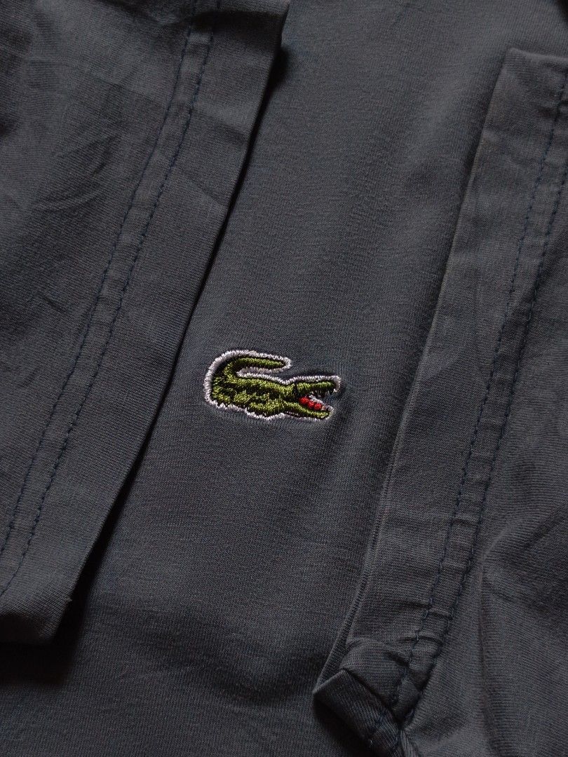 Lacoste navy blue shirt (Category: Formal Shirts) located in Davao. Submitted by jeff_thrifts (Listing ID 1467850158, Image 3). Description: good condition see last photo for the issue no pinholes dm if interested.