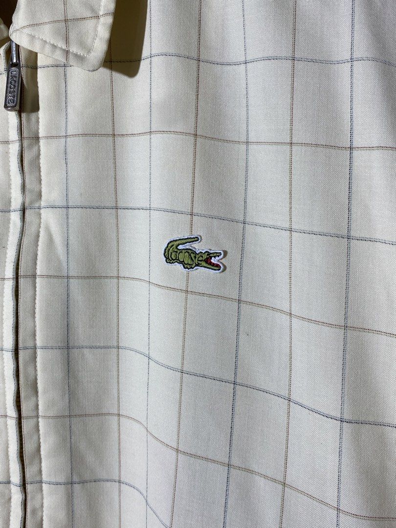 Lacoste Plaid Zip-Up Jacket (Category: Coats, Jackets and Outerwear) located in Caloocan City. Submitted by rhouzze.ph (Listing ID 1467967483, Image 2). Description: Name: Lacoste Polo Jacket Dimensions: 24.5 by 26 Size: Large Condition: Excellent Condition Issue: None.