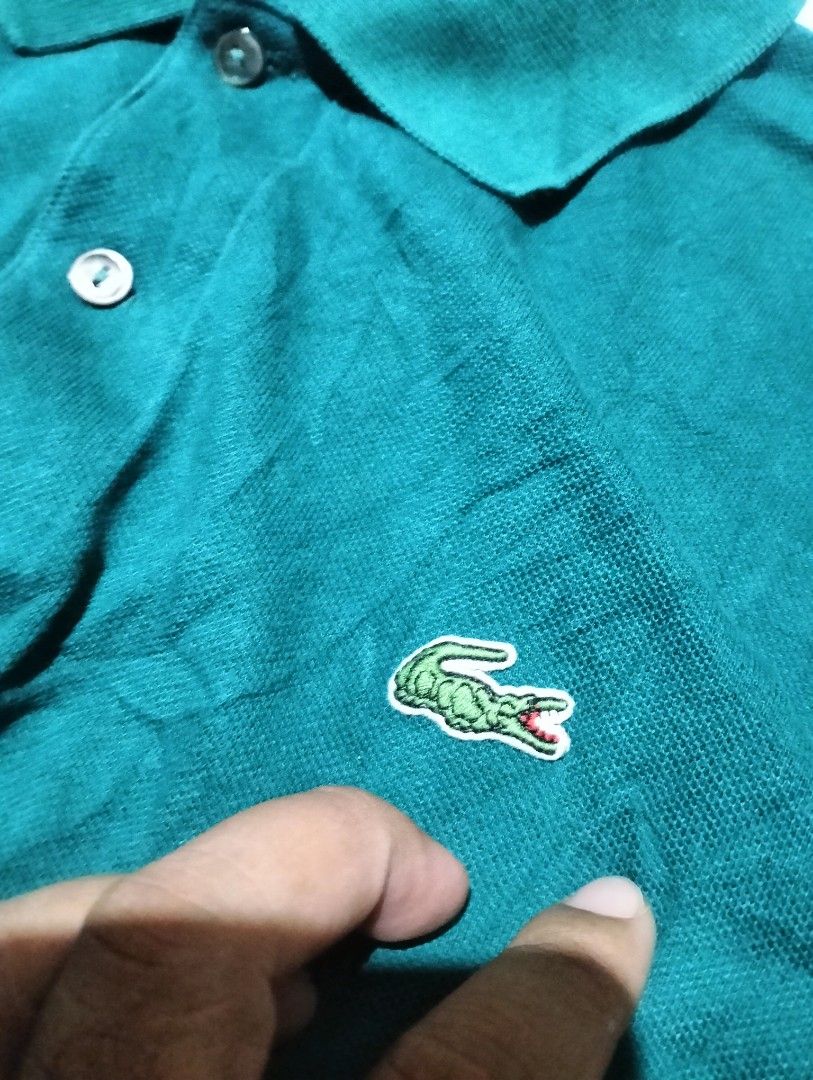Lacoste polo long sleeves (Category: Luxury Apparel) located in Solana. Submitted by allgoodst.s (Listing ID 1468053682, Image 2). Description: Lacoste polo long sleeves green color way size 4 dimes w20 x 26.5L VG condition no issues.