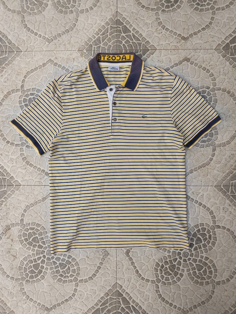 Lacoste Polo Shirt (Category: Tshirts & Polo Shirts ) located in Cebu City. Submitted by authenticgrids (Listing ID 1467897765, Image 1). Description: Y2k Lacoste Stripped Polo Shirt Excellent Condition ✨ Issue/s:None Size On Tag 🏷️ 4 Medium Lacoste Dimensions Width 20 inches Length 27 inches 📥📥📥📥📥 DM us for more details.