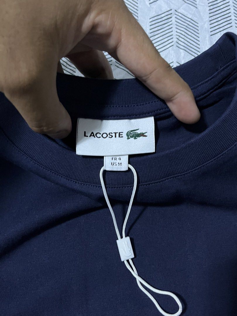 Lacoste Spell Out Tshirt (Category: Tshirts & Polo Shirts ) located in Manila. Submitted by madisonkros (Listing ID 1467953337, Image 3). Description: Lacoste Spell Out Tshirt Authentic Sz4 21x28 Fitted onyly Rfs: Wrong size, sobrang liit sakin gift lg po siya since hnd kona masosoot benta ko nalang 2,500 free sf .