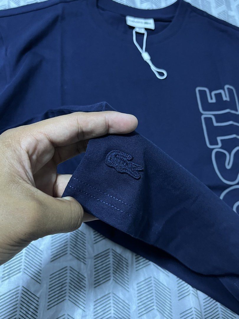 Lacoste Spell Out Tshirt (Category: Tshirts & Polo Shirts ) located in Manila. Submitted by madisonkros (Listing ID 1467953337, Image 2). Description: Lacoste Spell Out Tshirt Authentic Sz4 21x28 Fitted onyly Rfs: Wrong size, sobrang liit sakin gift lg po siya since hnd kona masosoot benta ko nalang 2,500 free sf .