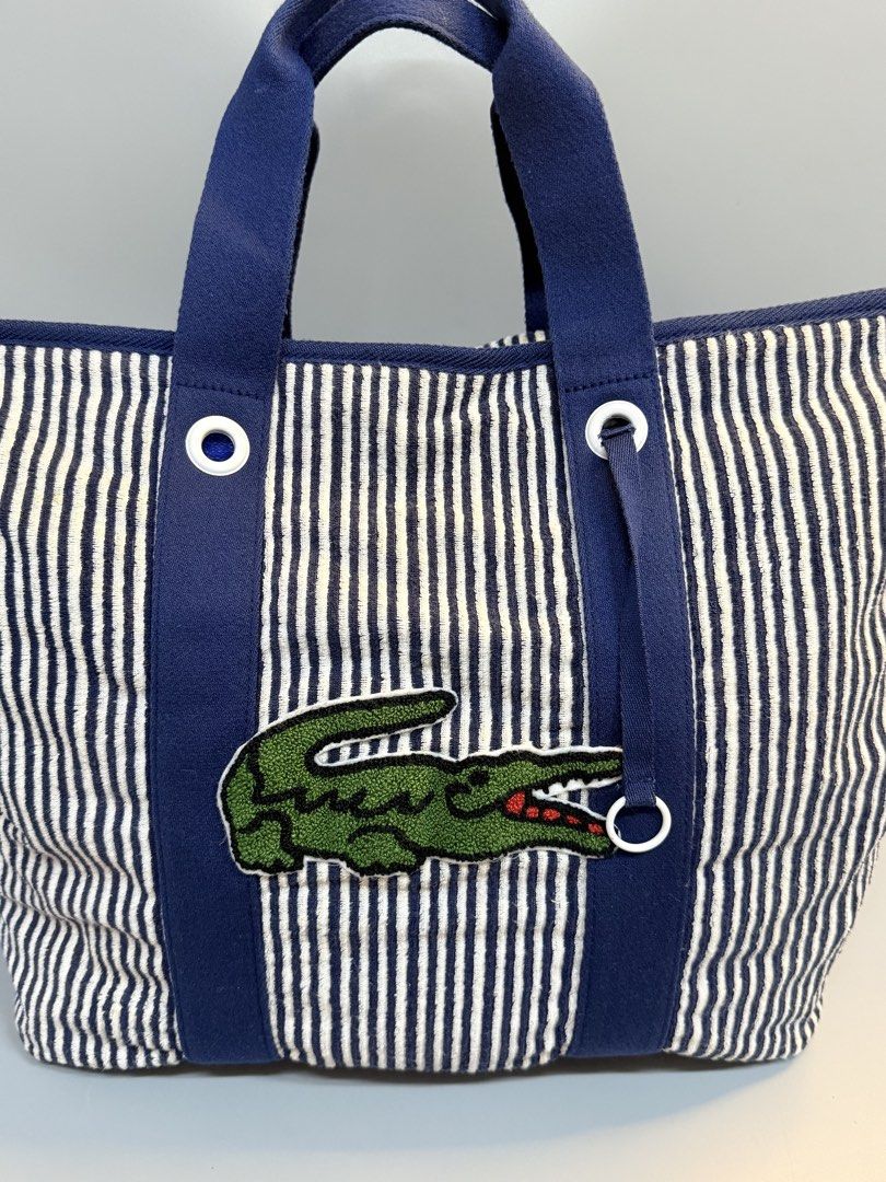 Lacoste Totebag BIG LOGO (Category: Tote Bags) located in Cebu City. Submitted by ricahsukaybags_2017 (Listing ID 1467864264, Image 2). Description: Big logo lacoste tote. Canvass no flaws.