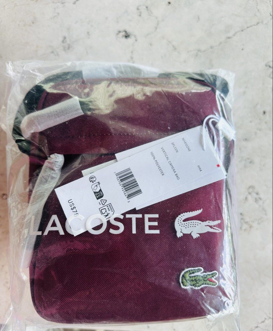 Lacoste Vertical Bag (Bundle price) (Category: Sling Bags) located in Cavite. Submitted by hennats (Listing ID 1467869523, Image 2). Description: 💰 SET PRICE: ₱6,000 only (LAST PRICE!) 📌 Sold as a set only. 🐊 FOR SALE | ORIGINAL LACOSTE BAGS 🇺🇸 💯 Authentic Lacoste – Bought in the USA! 🎨 Colors: Maroon & Blue ✨ PRODUCT HIGHLIGHTS: • Signature Lacoste appliqué logo • Adjustable shoulder strap • Front and top zip fastening • Spacious main com