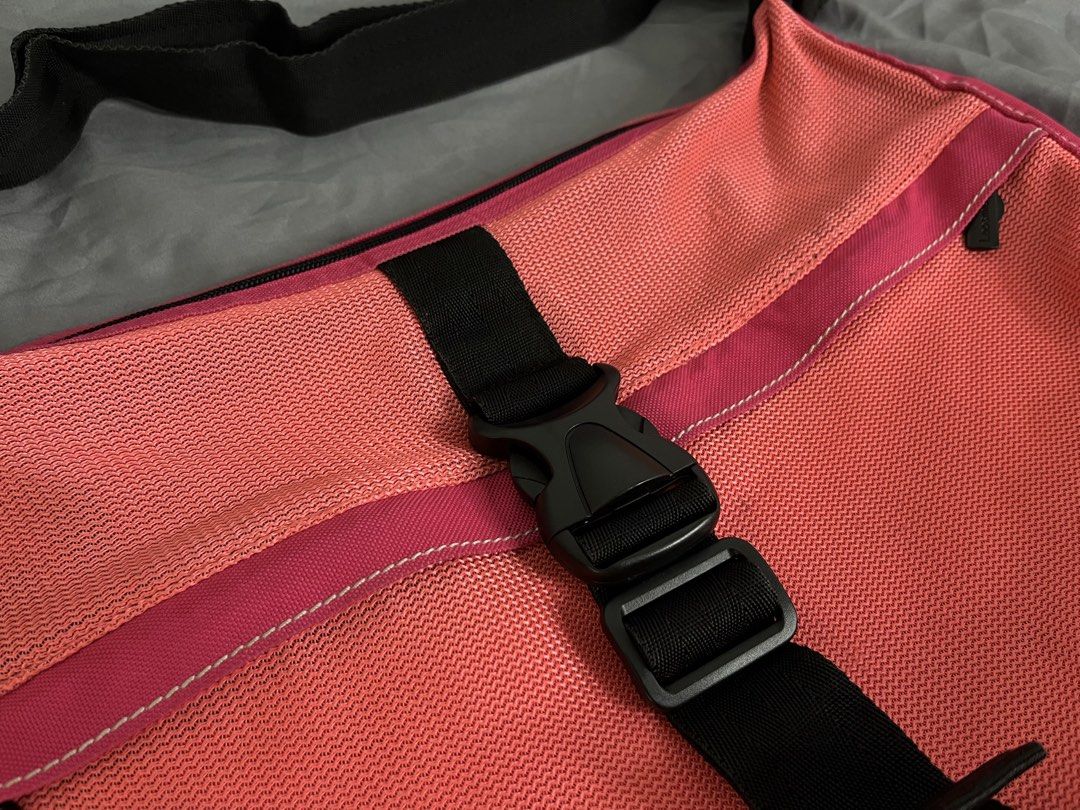 Laosmiddle Pink Messenger Bag with Buckle Strap (Category: Cross-body Bags) located in Imus. Submitted by graeyowl (Listing ID 1467947669, Image 2). Description: Item Description: • Brand: Laosmiddle • Style: Crossbody Messenger / Sling Bag • Material: Durable woven nylon mesh and canvas • Color: Bright Coral Pink / Hot Pink / Black Accents • Closure: Large adjustable center strap with a heavy-duty quick-release plastic buckle • Pockets: Easy-acc