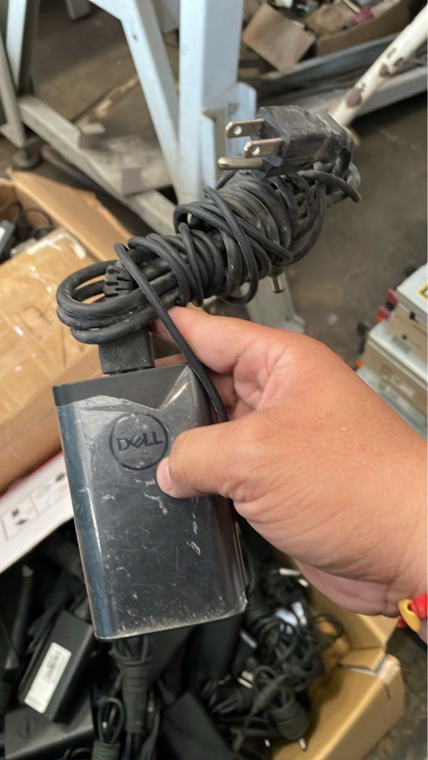 Laptop Power Adapter Charger (Category: Chargers) located in Calamba. Submitted by jozamvibar76665 (Listing ID 1467862218, Image 3). Description: - Authentic Dell 130W laptop charger (black power brick with attached power cord and barrel plug) - Standard US two-prong wall plug included - Pulled from a working corporate environment and fully tested - Reliable power supply for compatible Dell laptops - Bulk stock available if you need multiple unit