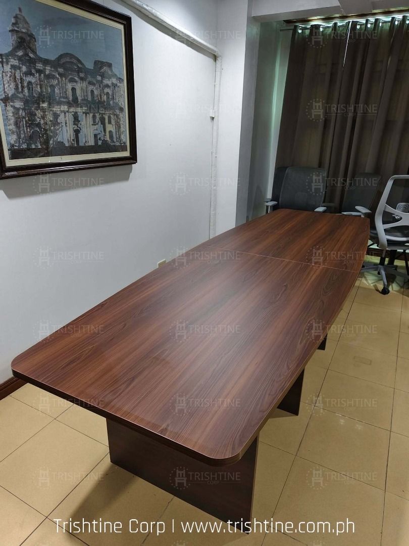 Large Wooden Conference Table Office Meeting Table (Category: Office Furniture & Fixtures) located in Caloocan City. Submitted by jim.trishtineofficefurnitures (Listing ID 1467892965, Image 2). Description: - Type: Large rectangular office meeting table - Finish: Elegant dark wood grain with sturdy panel legs - Capacity: Comfortably seats several people - Ideal For: Team catch-ups and client presentations - Note: Pickup only due to its size DISCL