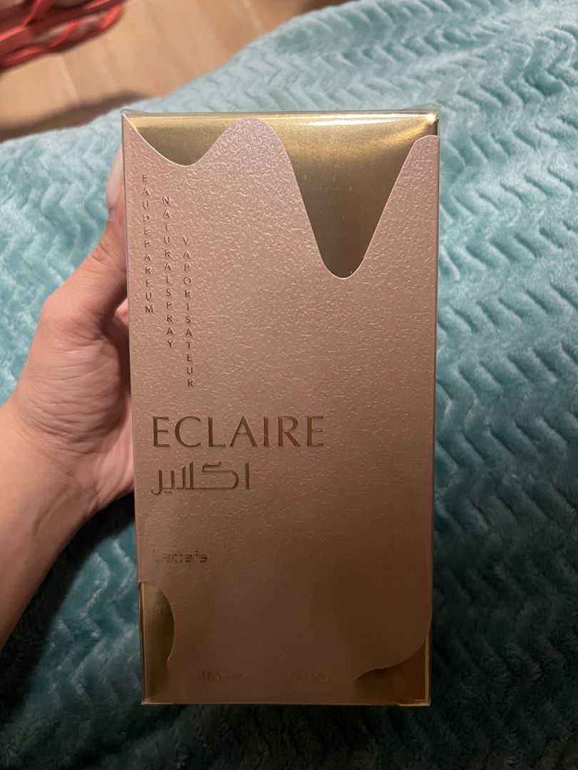 Lattafa Eclaire Eau De Parfum 100ml (Category: Fragrance & Deodorants) located in Angeles City. Submitted by ldmtrading (Listing ID 1468022180, Image 1). Description: - Brand: Lattafa - Fragrance Name: Eclaire - Type: Eau de Parfum (Natural Spray / Vaporisateur) - Volume: 100ml / 3.4 fl. oz. - Condition: Brand new, still wrapped in original clear plastic shrink wrap - Packaging: Stunning gold and pink textured box.