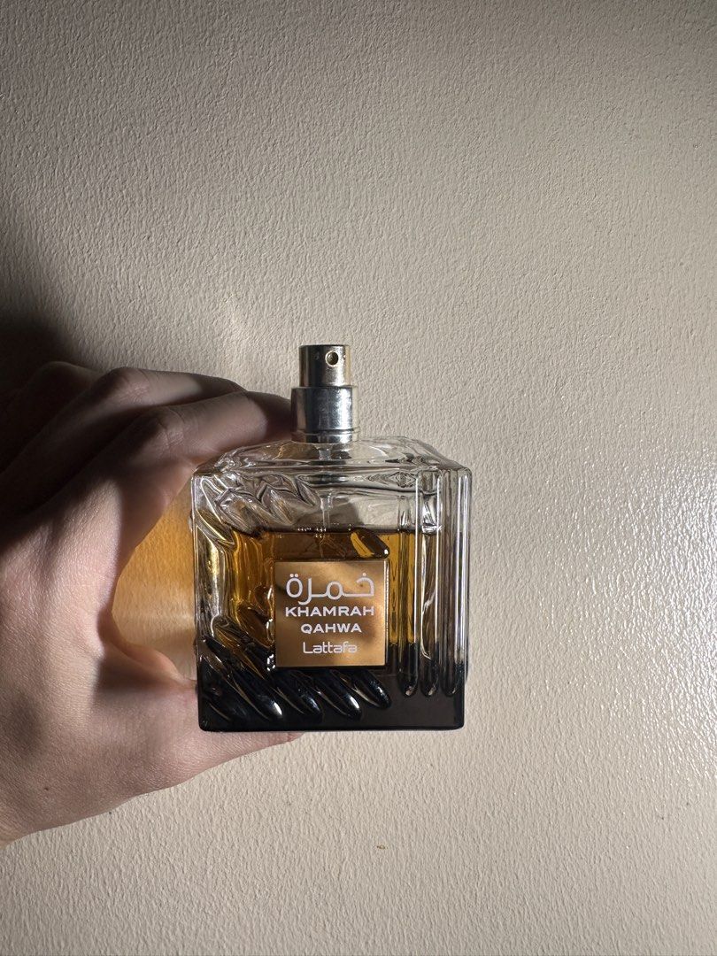 Lattafa Khamrah Qahwa Eau De Parfum 100ml (Category: Fragrance & Deodorants) located in Caloocan City. Submitted by jhk2922 (Listing ID 1467969813, Image 2). Description: - Authentic Lattafa Khamrah Qahwa 100ml Eau de Parfum - Rich, warm spicy and coffee fragrance notes - 98% juice remaining (sprayed just a few times) - Comes in a heavy crystal glass bottle with elegant gold lettering - Original brown presentation box included - Stored properly i
