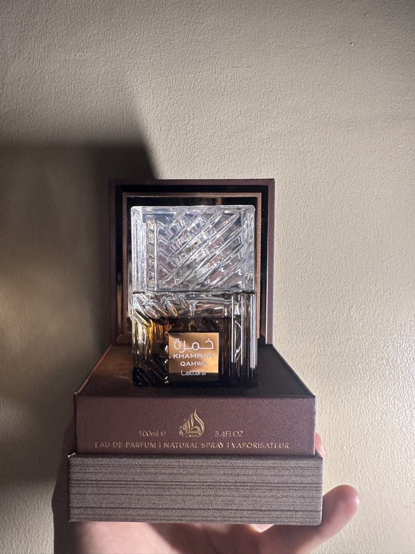 Lattafa Khamrah Qahwa Eau De Parfum 100ml (Category: Fragrance & Deodorants) located in Caloocan City. Submitted by jhk2922 (Listing ID 1467969813, Image 1). Description: - Authentic Lattafa Khamrah Qahwa 100ml Eau de Parfum - Rich, warm spicy and coffee fragrance notes - 98% juice remaining (sprayed just a few times) - Comes in a heavy crystal glass bottle with elegant gold lettering - Original brown presentation box included - Stored properly i